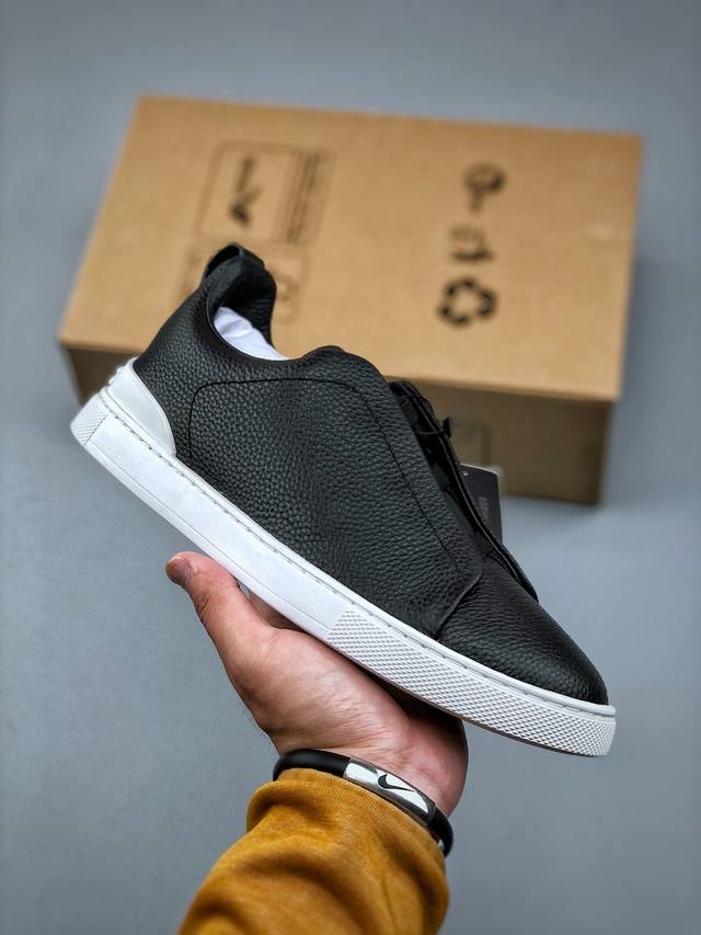 Zegna Tiziano Low-Top Sneakers This Tiziano Low-Top Sneaker Is Made Of Tumbled C