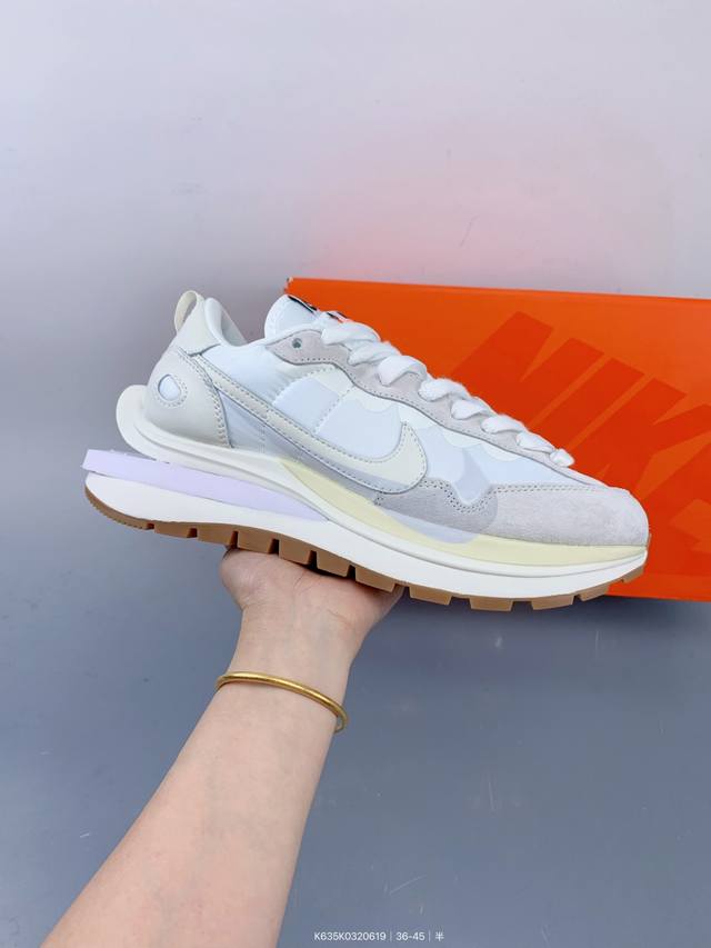 Nike Sacai x Nike Regasus Vaporrly Sp 3.0 catwalk shoe body is made of suede and
