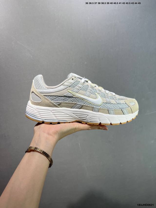 Nike P-6000 running shoes use red hooks on the inside and outside, and are made