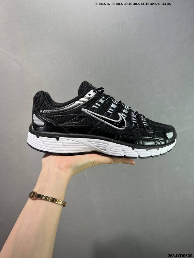 The Nike P-6000 running shoes have red hooks on the inside and outside, and are