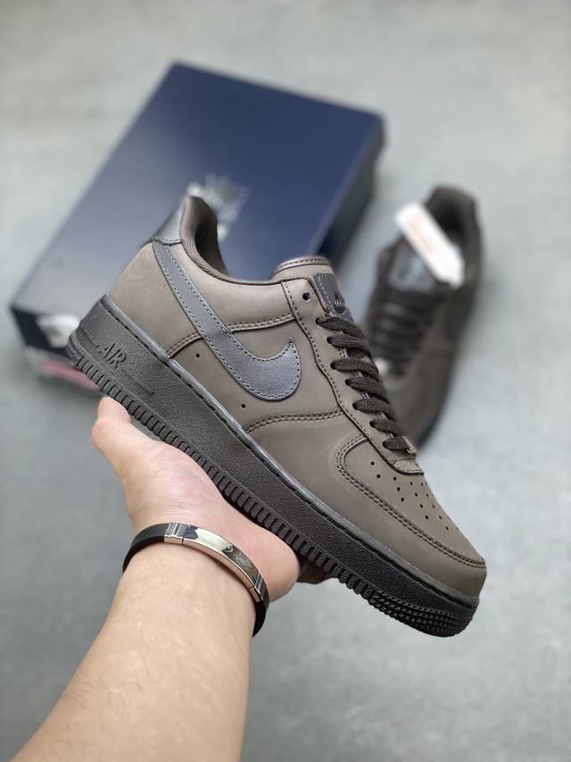 Nike Air Force 1 '07 Air Force One low-top casual sneakers in beige and gray. Th