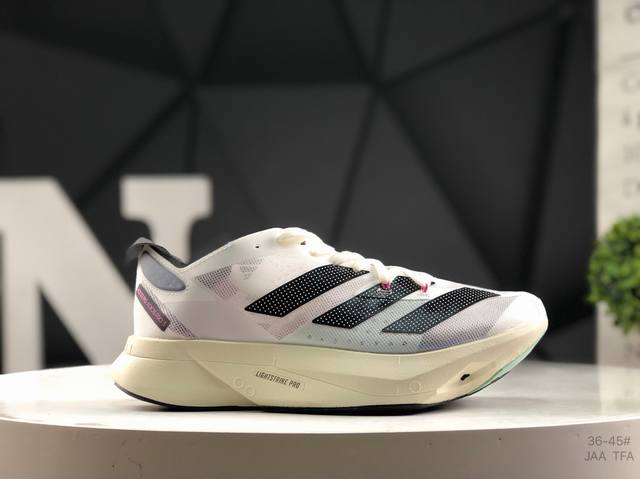 Adidas Adios Pro 3 W foam with a carbon fiber plate for cushioning and breathabi
