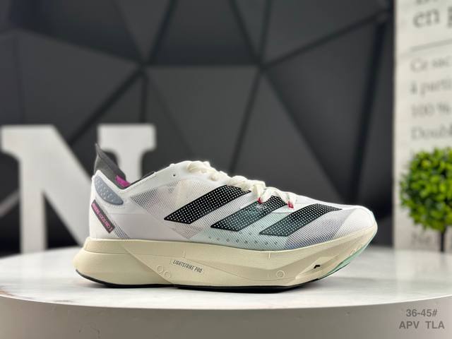 Adidas Adios Pro 3 W foam with a carbon fiber plate for cushioning and breathabi