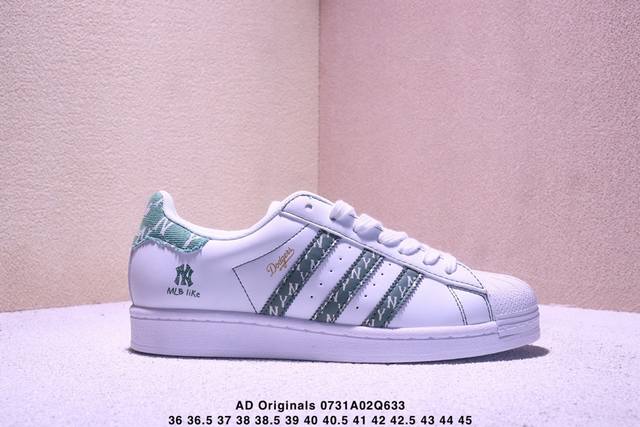 This limited-edition Clot x Ad Originals ShellToeNy collaboration features soft,