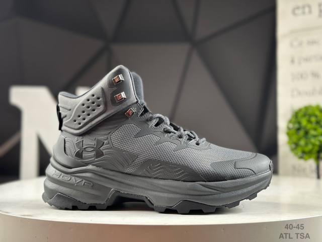 Under Armour Cy high-top hiking shoes feature a mesh knitted synthetic leather u