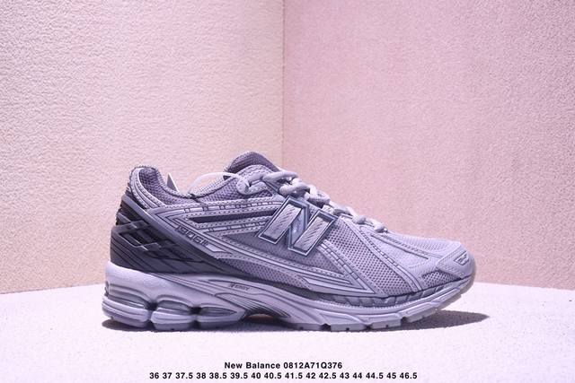 A corporate-grade New Balance M1906 retro piece, a treasured dad shoe. This cor