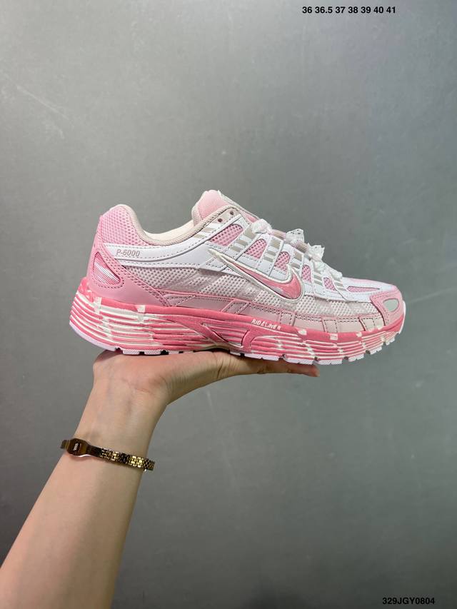 The company-grade Nike P-6000 running shoes feature red hooks on both the insid