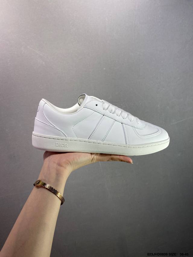 Dior mesh low-top sneakers. This collection features a black mesh fabric, white