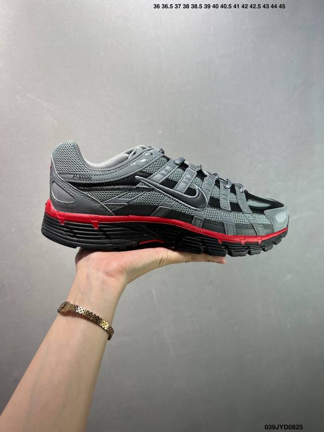 The company-grade Nike P-6000 women's running shoe features red hooks on both t