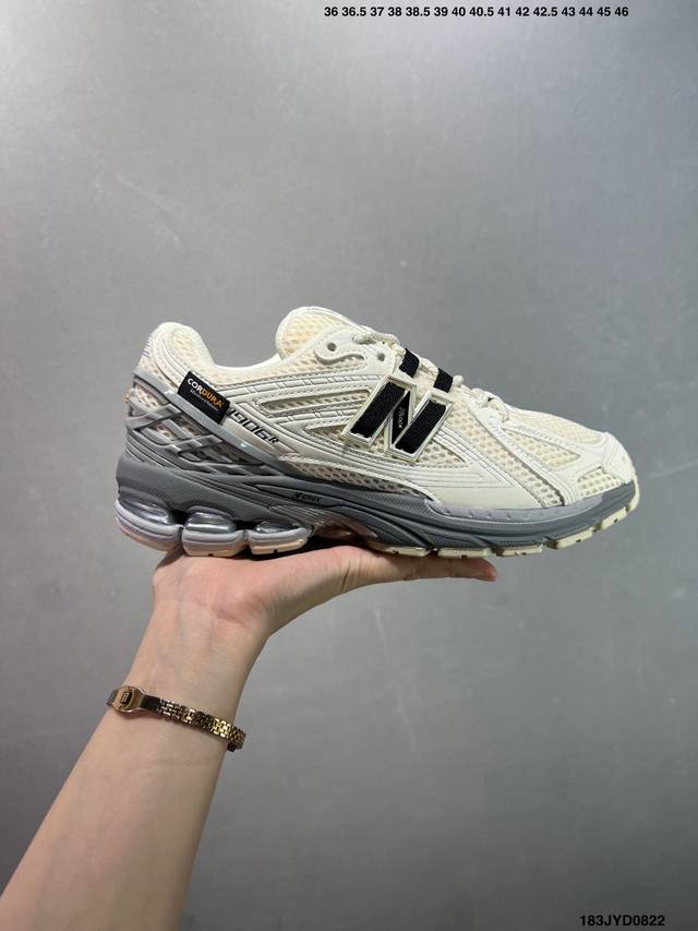 A corporate-grade New Balance M1906 retro piece, a treasured dad shoe. This cor