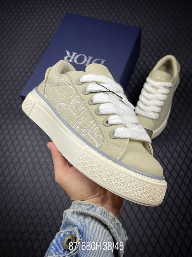 H The Dior B33 sneaker reinterprets the classic tennis shoe with a sleek silhoue