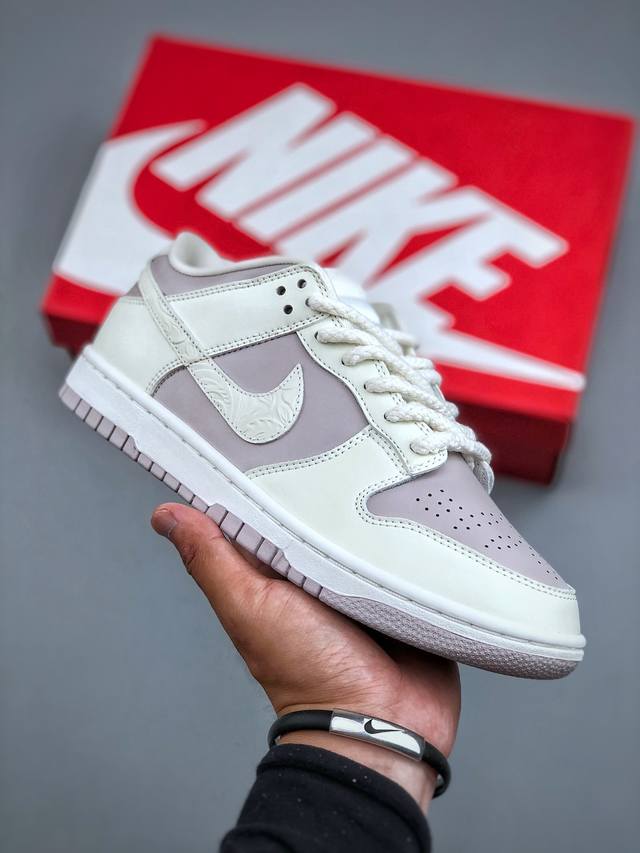 S version of the Nike Dunk Low in Lotus Root Powder White. Highly recommended. M