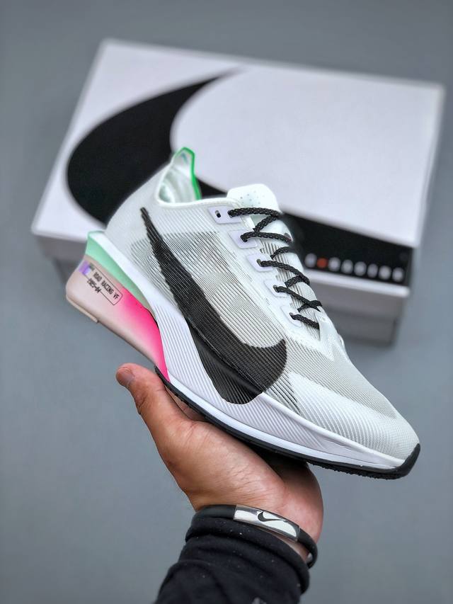 Nike Zoomx Vaporfly Next% 4 lightweight, breathable mesh running shoes. This nex