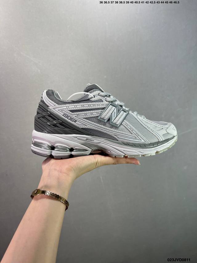 A corporate-grade New Balance M1906 retro piece, a treasured dad shoe. This cor