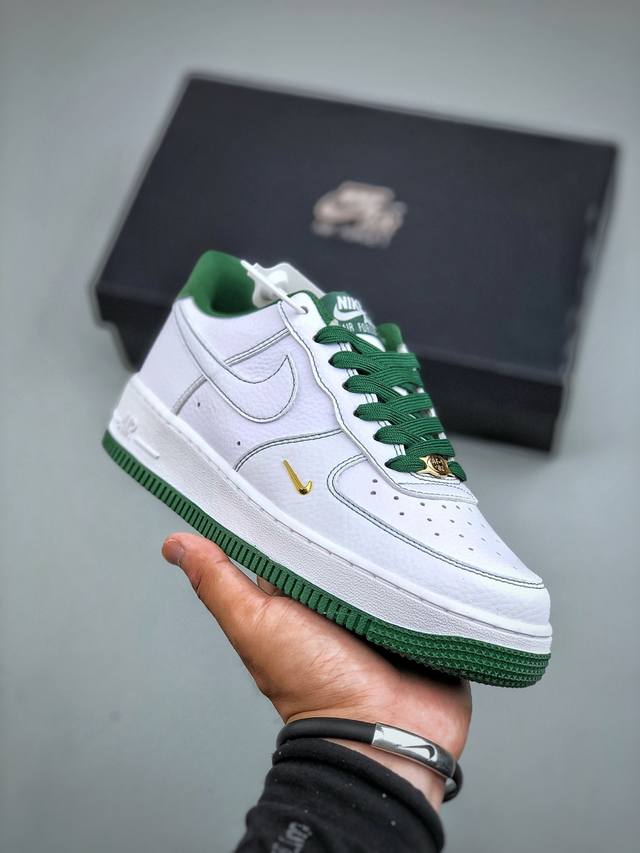 Nike Air Force 1 Low in white and green, featuring original lasts and cardboard