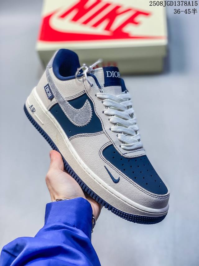 Dior x Nike Air Force 1 Low collaboration blue, white, and gray casual sneakers