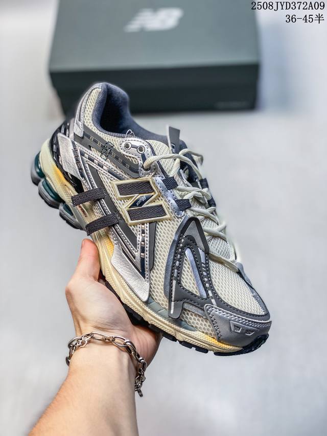 A company-grade, authentic New Balance M1906 retro sneaker from the New Balance