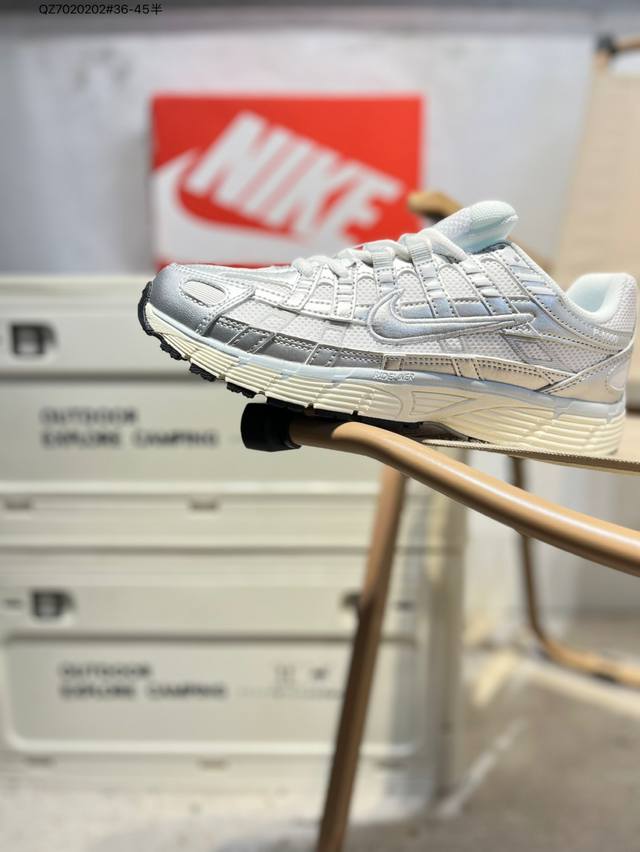 Nike P-6000 Laser Blue retro tech-inspired sports dad shoes. This shoe features