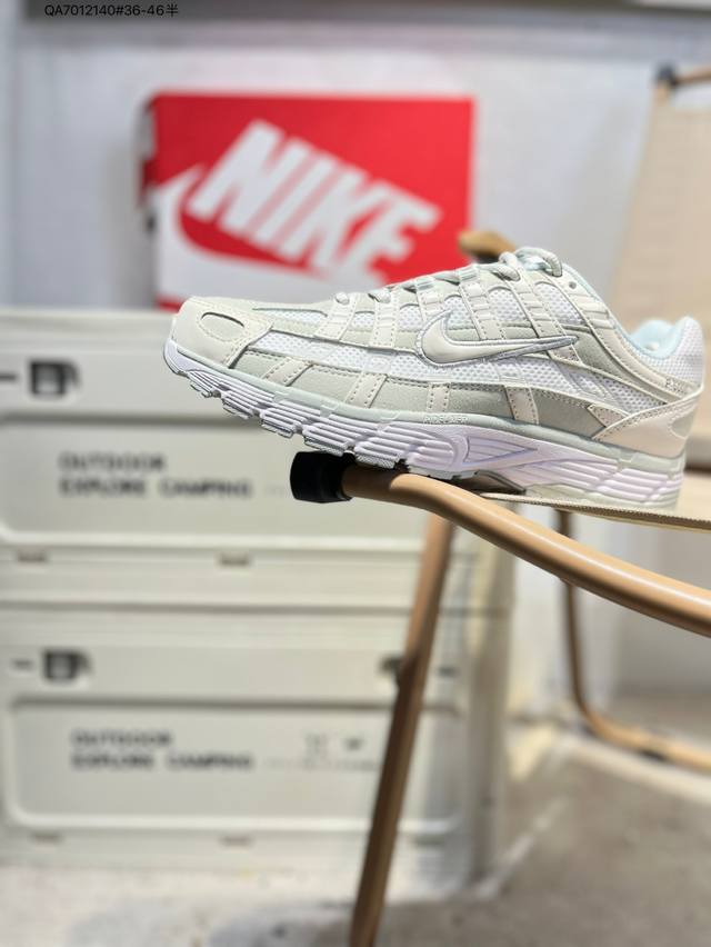 Nike P-6000 Laser Blue retro tech-inspired sports dad shoes. This shoe features