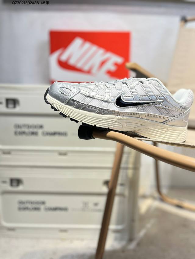 Nike P-6000 Laser Blue retro tech-inspired sports dad shoes. This shoe features