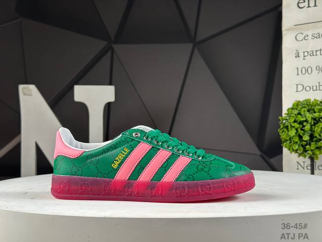 The Adidas X Gucci collaboration features the Trefoil logo and the iconic three-