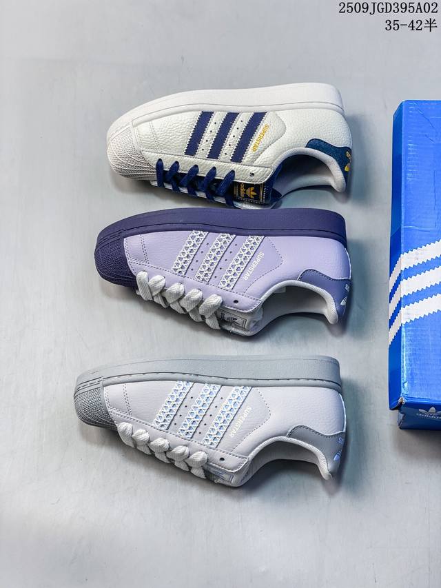 Ad Originals Superstar classic retro shell-toe sneakers, first introduced in 196