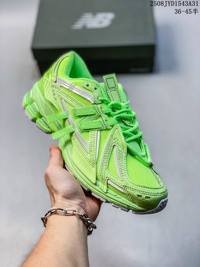 A corporate-grade New Balance M1906 retro piece, a treasured dad shoe. This cor
