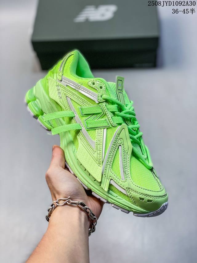 A corporate-grade New Balance M1906 retro piece, a treasured dad shoe. This cor