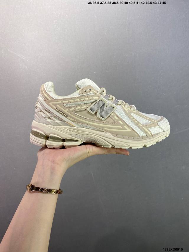 A corporate-grade New Balance M 6 retro classic, a classic dad shoe. This corpo