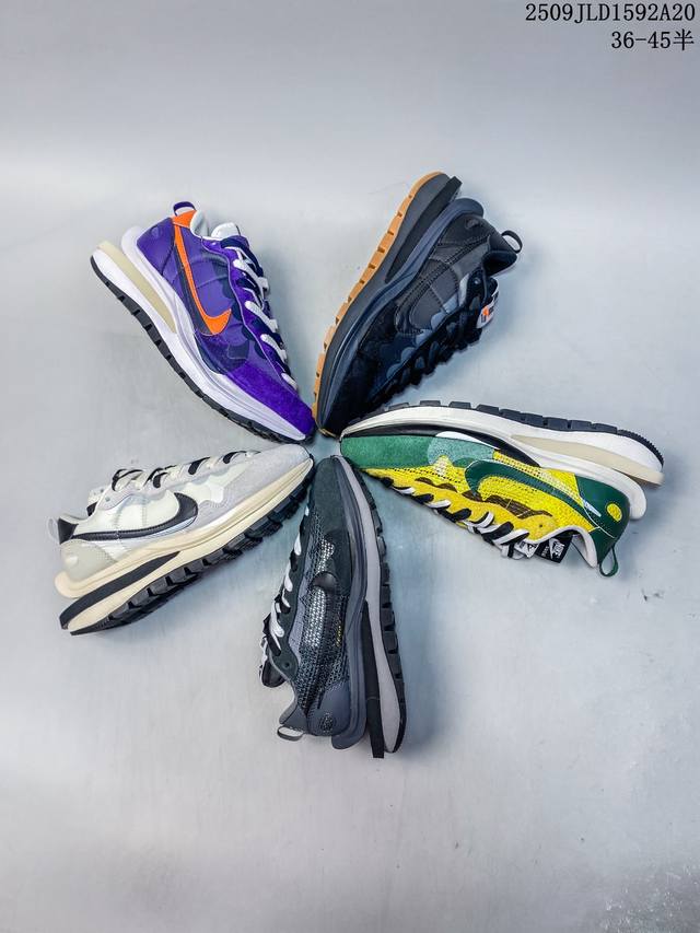 The Nike Sacai x Nike Regasus Vaporrly Sp 3.0 runway shoe is made of suede and b