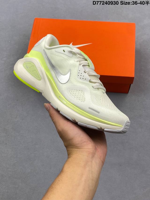 The Nike Air Zoom Structure 26 lightweight running shoe features an upper made o