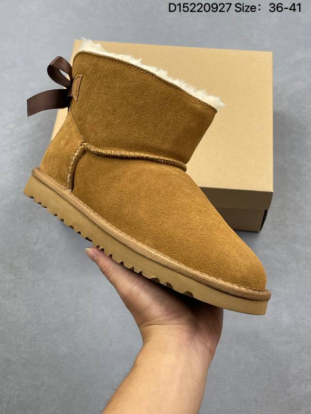Corporate-grade Ugg women's snow boots, made in Guangdong, feature a TPU molded