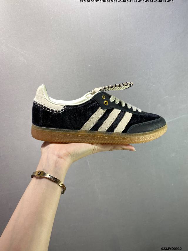 A classic, retro low-top, casual sports running shoe from the Wales Bonner x Ad