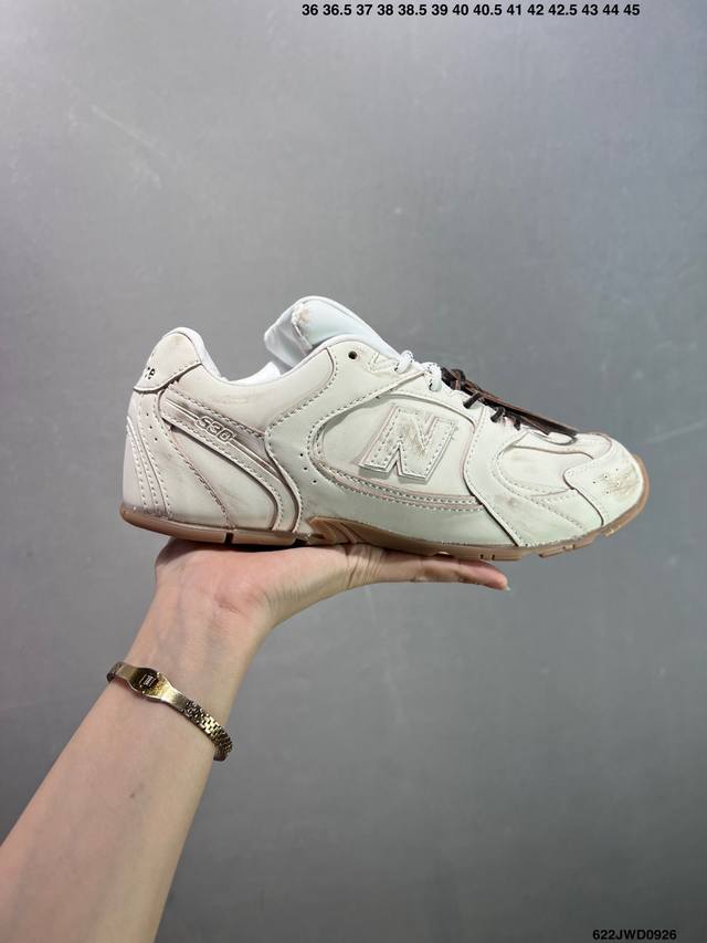 A corporate-grade Miu Miu x New Balance collaboration. This preppy, corporate-g