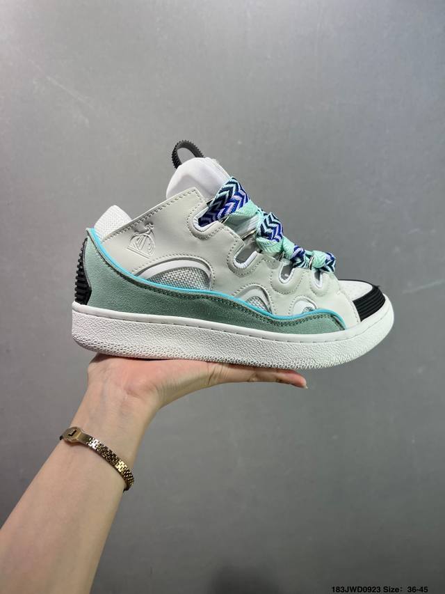 French luxury brand Lanvin's Curb Leather Low-Top Sneakers are retro streetwear