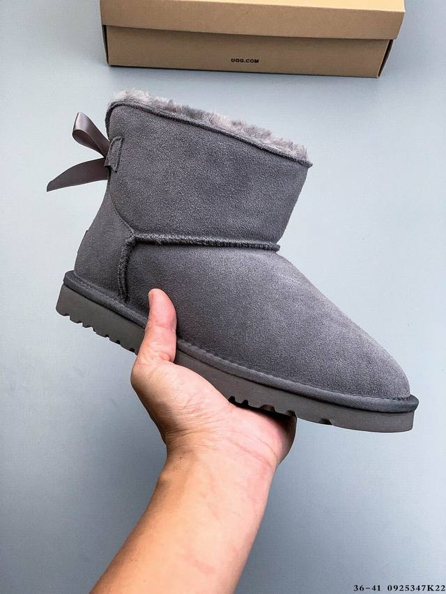 Ugg bow autumn and winter sheepskin snow boots are made entirely of Zp's same fa