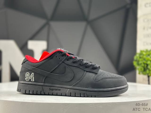 Nike Supreme X Nike Dunk SB Low. This shoe features an embroidered "94" on the h
