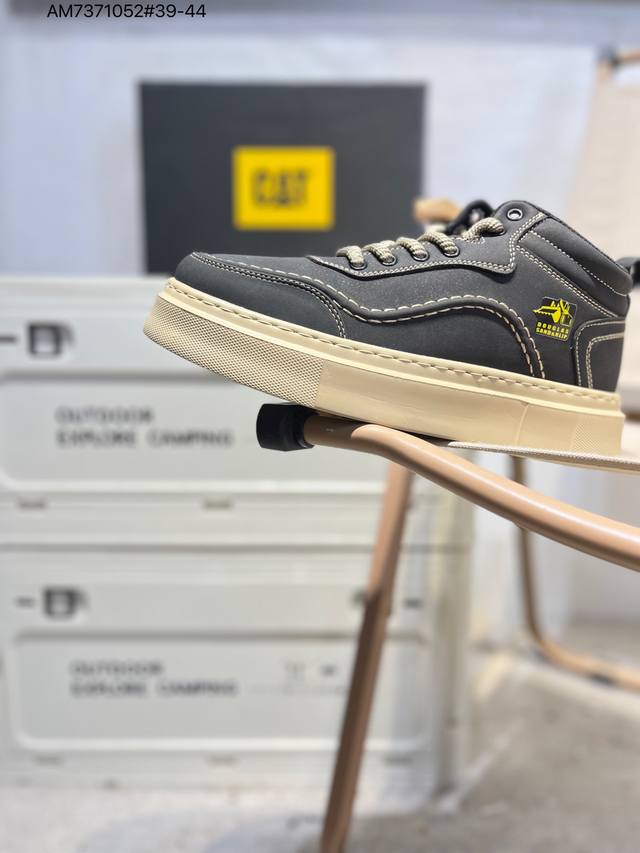 Cat, the brand behind the Caterpillar bulldozer, series workwear and casual shoe