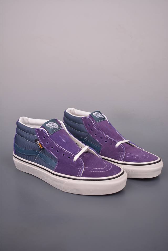Vans Sk8-Mid Blue and Purple Patchwork Retro Mid-Top Vulcanized Canvas Shoes. Th