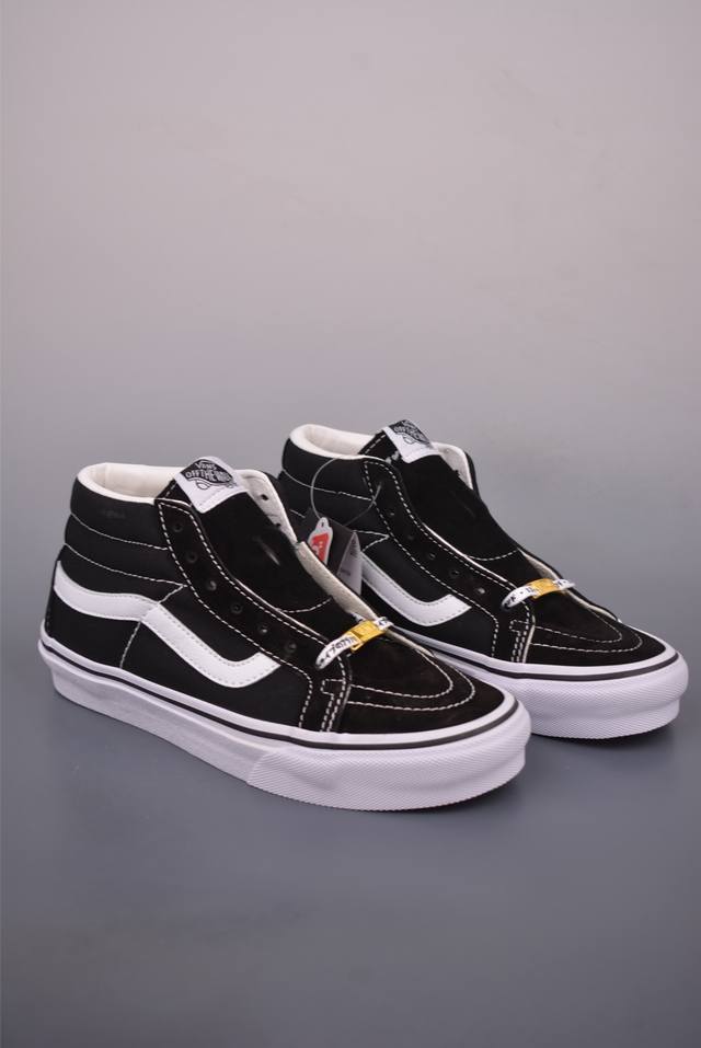Vans Sk8-Mid Mid-top. Featuring the classic Sk8-Mid silhouette, this shoe is ado