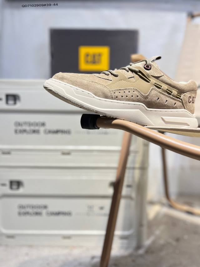 Cat, the brand behind the Caterpillar bulldozer, series workwear and casual shoe