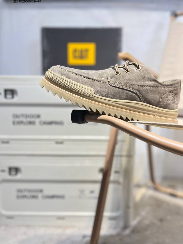 Cat, the brand behind the Caterpillar bulldozer, series workwear and casual shoe