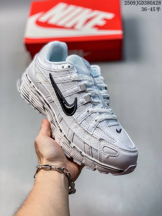 Nike P-6000 running shoes feature red Swooshes on both the inner and outer sides