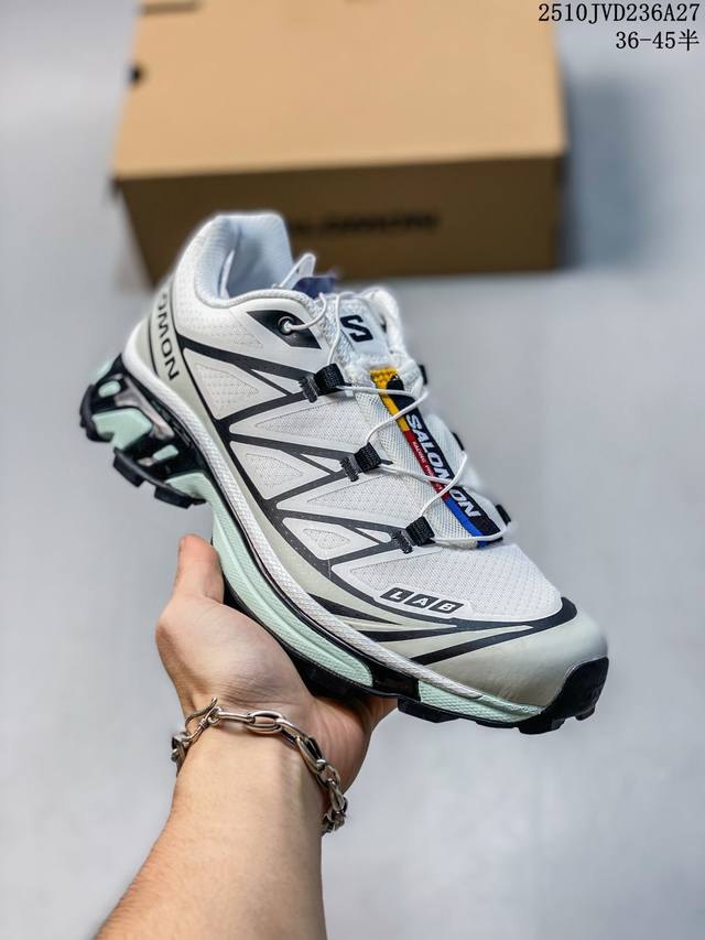 Company-grade Salomon XT-6 outdoor trail running shoes. The upper features Sensi