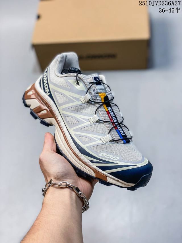 Company-grade Salomon XT-6 outdoor trail running shoes. The upper features Sensi