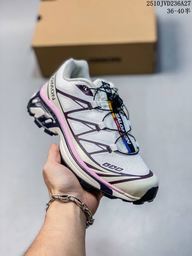 Company-grade Salomon XT-6 outdoor trail running shoes. The upper features Sensi