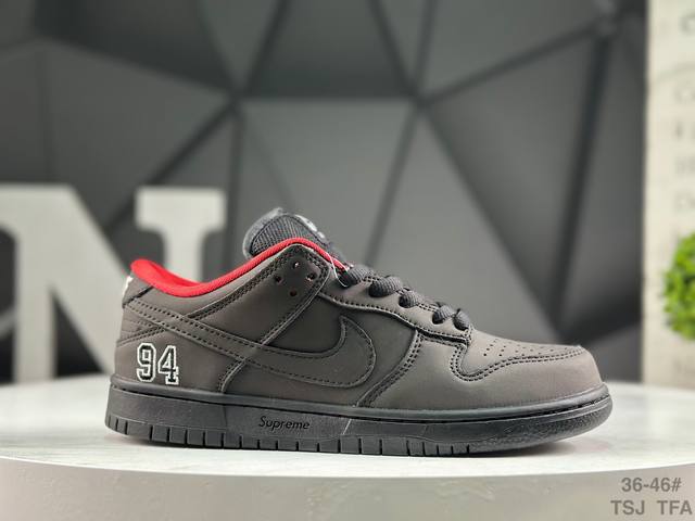 Nike Supreme X Nike Dunk SB Low. This shoe features an embroidered "94" on the