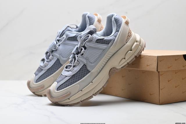 Company Grade Nike Zoom Vomero Roam Retro Casual Running Shoes Features an upgr