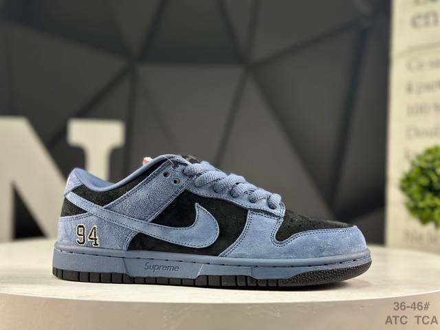 Nike Supreme X Nike Dunk SB Low. This shoe features an embroidered "94" on the