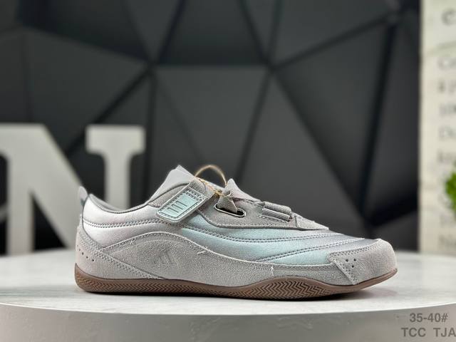 Adidas Urban Reverie Retro Classic German Training Shoe, featuring a simple colo